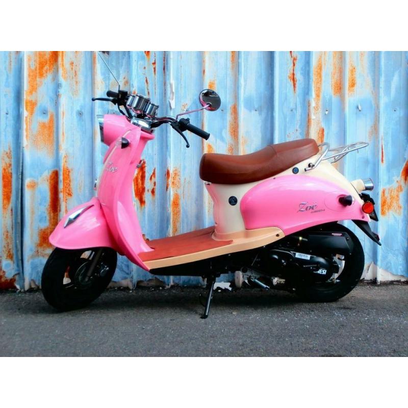 Nouveau scooter Zoë rose / crème classe A ou B.